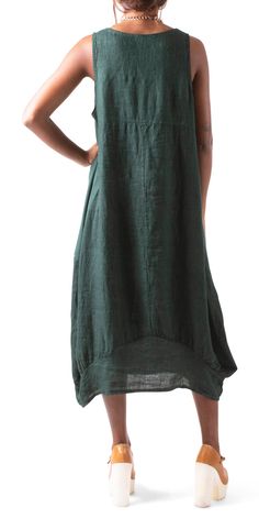 Full Linen Sleeveless Dress that Falls about Mid-Length. There are Elastic Side Panels and Pockets. 100% Linen One Size / OS Model 5'8" Made in Italy Green Sleeveless Linen Casual Dress, Spring Sleeveless Lagenlook Midi Dress, Sleeveless Lagenlook Midi Dress For Spring, Casual Green Sleeveless Linen Dress, Flowy Sleeveless Lagenlook Dress, Green Linen Sleeveless Sundress, Spring Sleeveless Midi Dress In Relaxed Fit, Spring Midi Dress Sleeveless Relaxed Fit, Sleeveless Midi Dress For Spring With Relaxed Fit