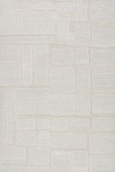 a white rug with squares and rectangles on it