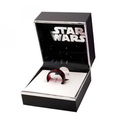 a star wars ring in a black box