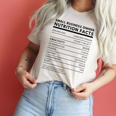 "Rock your entrepreneurial spirit with our \"Small Business Owner Nutritional Facts\" graphic tee by Bella Canvas. This clever design is both a humorous play on product nutritional labels and a true reflection of the daily life and dedication of a small business owner. Whether you're the proud founder of a startup, a dedicated CEO, or hunting for the perfect gift for an entrepreneurial friend, this shirt resonates with the challenges, joys, and humor of the business world. Product Features: Brand: Authentic Bella Canvas - the epitome of comfort and durability. Design: Exclusive \"Small Business Owner Nutritional Facts\" graphic - wear your business journey with a twist of humor. Style:Modern unisex fit - perfect for visionary leaders of all genders! Gift Potential:An outstanding gift for n Cute Cricut Shirts Business, Women Entrepreneur Shirt, Small Business Tshirt Printing, Minding My Own Small Business Shirt, Business Owner Shirts, Small Business Shirt, New Business Owner, Business Owner Gifts, Business Shirts