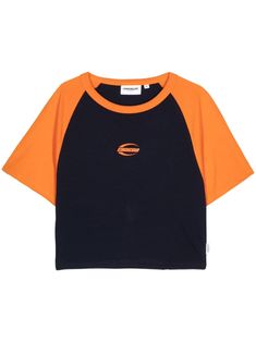 pumpkin orange/black cotton jersey texture colour-block panelled design contrasting crew neck short raglan sleeves logo print to the front logo tag to the side cropped straight hem Sporty Tops With Contrast Sleeves For Streetwear, Orange Athleisure Top For Streetwear, Casual Orange Tops With Contrast Color, Orange Athleisure Short Sleeve Tops, Orange Short Sleeve Athleisure Top, Sporty Raglan Sleeve T-shirt With Contrast Sleeves, Sporty T-shirt With Contrast Raglan Sleeves, Orange Sporty Crew Neck Top, Orange Crew Neck Athleisure Top