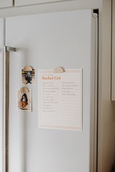 a white refrigerator with magnets and pictures on it