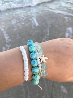 Clear Waters is a teal themed bracelet stack with three adjustable bracelets and one elastic bracelet. It is water resistant but I recommend limiting water exposure to preserve color. Cheap Trendy Stretch Bracelet For Beach, Cheap Ocean-inspired Bracelets For Beach Season, Cheap Glass Beaded Bracelets For Beach, Stackable Casual Friendship Bracelets For Beach, Turquoise Stackable Adjustable Beaded Bracelets, Green Stackable Stretch Bracelet For Beach, Adjustable Stackable Turquoise Beaded Bracelets, Adjustable Ocean-inspired Turquoise Beaded Bracelets, Adjustable Turquoise Ocean-inspired Bracelet