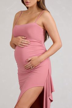 Made to comfortably contour your new curves. Cut Stem is the maternity dress to celebrate you and your plus one in the fresh season ahead. This blush pink maxi dress is crafted from our signature stretch jersey in a strappy silhouette with a ruffle-trimmed skirt split. Style this dreamy dress with simple gold hoops for a timeless baby shower look.Features- Premium stretch jersey- Straight neckline- Adjustable cami straps- Invisible zip closure- Split hemline- Ruffle trim- Maxi lengthSizing & FitModel is 5'8" and wears UK size 8 / US size 4Product InformationDesigned exclusively by Club L LondonDouble layered with excellent stretchPremium jersey in Blush Pink (95% Polyester. 5% Elastane)153cm total lengthSKU: CL129557081 Pink Fitted Maternity Maxi Dress, Fitted Pink Maternity Maxi Dress, Fitted Pink Maternity Dress In Feminine Style, Pink Fitted Maternity Dress, Feminine Fitted Pink Maternity Dress, Fitted Pink Feminine Maternity Dress, Maternity Bump Friendly Pink Dress, Maternity Bump-friendly Pink Dress, Pink Maxi Length Maternity Dress