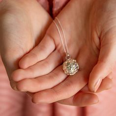 The stunning new starry night locket necklace. A most beautiful and innovative locket covered in the ninth sky, stars and the moon! It opens up to reveal a hanging disc which is hand stamped with your choice of up to three initials. Beautifully textured with polished smooth star embellishments and moon, this contemporary locket is available in all silver, or with rose or yellow gold plating. A truly gorgeous jewellery gift to give to a loved one to make a special occasion. Designed and made to b Celestial Pendant Locket Jewelry, Initial Pendant Jewelry With Star Charm As A Gift, Celestial Style Locket Jewelry Gift, Initial Pendant Jewelry With Star Charm, Celestial Locket Necklaces For Gifts, Celestial Locket Necklace For Gifts, Elegant Silver Locket Necklace With Birthstone, Celestial Pearl Pendant Jewelry As Gift, Anniversary Necklace With Round Star Charm Pendant