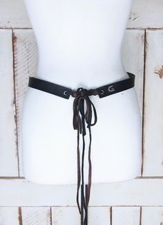 "Vintage Guess black/brown leather fringe boho/festival belt/tassel tie belt/medium Measurements: -marked size: medium -length without ties: 28\" -total length: 68\" -width: 7/8\" Features... -black leather -black/brown suede leather fringe ties -90's vintage Condition... -excellent vintage condition -missing one long suede tassel AA2480" Black Western Belt For Festivals, Western Black Belt For Festivals, Western Style Black Belt For Festivals, Adjustable Belts For Spring Festival, Adjustable Rustic Brown Belt, Rustic Adjustable Brown Belt, Rustic Brown Adjustable Belt, Black Leather Festival Belts, Black Leather Belts For Festivals