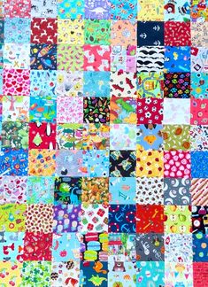 a colorful patchwork quilt with many different designs