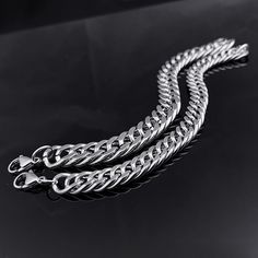 Unlock your inner hip-hop style and stand out in the crowd with this Grinding Chain Bracelet. Its intricate design will be sure to inject some energy into any outfit. Take on the world with confidence and flair! BUY TWO & Get 3rd* item Free from our UNISEX Goth Jewelry Collection. *The Lowest Priced Item. Must add 3 items to the cart to see the discount applied at the check out. GENDER: UNISEX 316L Stainless Steel Not allergic, Does not rust, Not deformed Water, Heat, Sweat Resistant Hypoallerge Green Skin, Goth Jewelry, Spaghetti Strap Mini Dress, Wedding Dress Shopping, Gothic Jewelry, Hip Hop Fashion, Intricate Design, Ring Necklace, Chain Bracelet