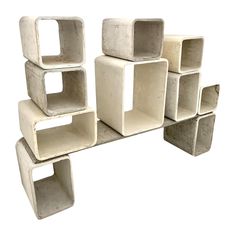 several square and rectangular concrete blocks stacked on top of each other