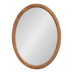 a round wooden mirror on a white background