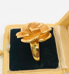 Fabulous huge sterling silver 18k gold vermeil rose ring. Large rose bud and petals...beautifully detailed. Nice shiny gold vermeil with minimal wear if any. Fully marked and acid tested as sterling silver. Flower measures 1 inch by 1 inch and is 3/8 inch in profile. Very 3 dimensional. Shoulders measure 5mm wide tapering to 3mm at back of band. Nice heavy quality ringweighs 11.2gms. Gorgeous Gold Rings With Rose Design In Fine Jewelry Style, Gold Rings With Rose Design Fine Jewelry, Gold Flower Ring With Rose Design For Anniversary, Formal Yellow Gold Flower Ring With Rose Design, Hallmarked 14k Rose Gold Flower Ring, Formal Gold Ring With Rose Design, Gold Rings With Rose Design For Anniversary, Anniversary Gold Rings With Rose Design, Vintage Rose Gold Flower Ring For Formal Occasions