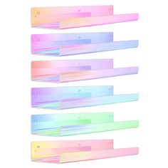 four pastel colored plastic shelf dividers on a white background