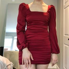 Red Satin Dress, That Hides Any Food Baby. Originally Got From Oh Polly. Model Is 5’6 & 140 Lbs. Dress Measurements: - Sleeve (From Where Bra Strap Sits On Shoulder): 24” - Waist, 23-30” - Length (From Top Of Shoulder Down) , 26” Long Sleeve Red Hoco Dress, Dark Red Dress Long Sleeve, Dark Red Bodycon Dress, Dark Red Graduation Dress, Dark Red Dress Short Long Sleeve, Red Dresses For Birthday, Solid Long Sleeve Ruched Mini Dress, Solid Ruched Back Dress For Date Night, Solid Dress With Ruched Back For Date Night