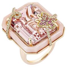 An ancient Kunzite ring with a butterfly studded with pink opal and pink tourmaline that add to the beauty of the ring and with studded diamonds on both sides of the Kunzite that add to the beauty of the ring is shown. This ring is composed of rose gold and is quite attractive. Kunzite Fancy Ring in 18Karat Rose Gold with Pink Tourmaline, Pink Opal and White Diamond. Kunzite: 42.79 carat, 22X17mm size, octagon shape. Pink Tourmaline: 0.09 carat, 1.40mm size, round shape. Pink Tourmaline: 0.09 ca Luxury Octagon-shaped Diamond Jewelry, Kunzite Ring, Peach Jewelry, Octagon Shape, Fancy Rings, Pink Opal, Heel Boots, A Butterfly, High Heel Boots