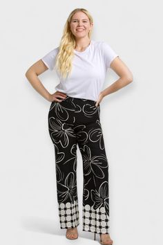 Step out in style with our Ava Black & White Floral Pants, crafted in Italy with lightweight viscose fabric. Designed for curvy women, these palazzo style wide-leg pants feature an elastic waistline and high rise for comfort and a flattering fit. Perfect for any occasion, pair with our matching blouse for a chic monochromatic look or mix it up with a pop of color and our Ava Black and White duster. Elevate your wardrobe today! Made in Italy by OltretempoComposition:100% ViscoseFit: Model is wear Stretch Viscose Ankle-length Wide Leg Pants, Summer Black Viscose Pants, Black Viscose Summer Pants, Black Viscose Pants For Summer, Spring Stretch Viscose Wide Leg Pants, Wide-leg Stretch Rayon Pants, Casual Viscose Wide Leg Full Length Pants, Casual Full Length Wide Leg Viscose Pants, Stretch Rayon Wide-leg Pants