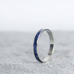 Silver Lapis Lazuli Ring Silver Lapis Lazuli Ring Features Sterling Silver Channel Ring 3.2mm Wide 100% Natural Crushed Lapis Lazuli Mixed With Resin Inside The Inlay Silver Lapis Lazuli Ring Benefits Includes a jewelry care card Includes a jewelry polishing pad (these are like magic!) Stacks great with other rings! Arrives ready to gift in a beautifully packaged box Free standard domestic shipping Insurance included Free returns & exchanges ☂ Our crushed powders are mixed with epoxy and cannot Blue Hypoallergenic Rings For Anniversary, Blue Hypoallergenic Promise Ring, Hypoallergenic Blue Rings For Anniversary, Minimalist Blue Hypoallergenic Rings, Chakra Throat, Metaphysical Jewelry, Celestial Blue, Inner Power, Lapis Lazuli Ring