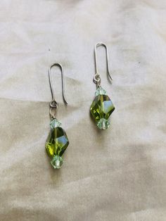 Cosmic Green Swarovski Crystals Earrings-SugarJewlz Handmade Jewelry Cheap Handmade Green Earrings, Nickel-free Green Earrings For Party, Green Nickel-free Party Earrings, Green Crystal Pierced Earrings For Party, Nickel-free Green Crystal Jewelry, Green Crystal Jewelry With Matching Earrings, Formal Green Nickel-free Earrings, Green Faceted Teardrop Earrings, Green Crystal Earrings For May Birthstone Gift