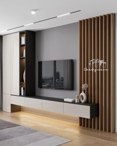 a modern living room with white and black furniture, wood slats on the wall