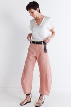 These pants combine the airy comfort of linen with a modern silhouette, offering a stylish option for warmer weather. With their tailored fit and breathable fabric, these pants effortlessly blend sophistication with laid-back charm, making them the perfect wardrobe staple. Tailored fit and tapered leg Elasticized waist with hook-and-bar closure Relaxed leg Breathable fabric Modern Wide-leg Pants For Summer, Relaxed Ankle-length Wide Leg Pants For Work, Versatile Linen Bottoms For Day Out, Chic Linen Wide Leg Pants For Day Out, Chic Linen Pants With Pockets, Chic Linen Wide Leg Pants With Loosely Fitted Hips, Modern Linen Wide Leg Pants For Workwear, Versatile Linen Wide Leg Pants For Day Out, Linen Wide-leg Pants For Day Out