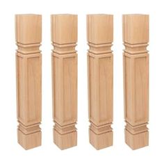 four tall wooden posts are lined up against each other on a white background with clippings for text