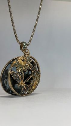 Looking for a piece that combines elegance with a touch of nature's magic? This clearly high workpersonship handcrafted dragonfly pendant necklace, with its delicate encrusted wings and floral motifs, set against a silver glass backdrop, is a stunning statement piece that will instantly elevate any outfit. Perfect for the free-spirited or those with a love for intricate, nature-inspired jewelry. ✨ Why It's Special: --> Crafted with love and attention to detail, featuring intricate dragonfly and Dragonfly Wings, Dragonfly Pendant, Wing Necklace, Silver Glass, Nature Inspired Jewelry, Inspired Jewelry, Necklace Black, Free Spirited, Black Mirror