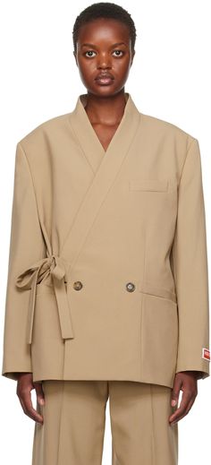 Wool twill blazer. · Wrap construction · Shawl collar · Button closure with self-tie fastening · Welt pockets · Padded shoulders · Logo patch at cuffs · Three-button surgeon's cuffs · Twin vents at back hem · Welt pocket at interior · Full viscose satin lining Supplier color: Dark beige Kimono Blazer, Beige Kimono, Kenzo Clothing, Dark Beige, Womens Blazers, Blazer Outfits, Mens Activewear, Womens Sweatpants, Shawl Collar