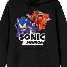 Celebrate your favorite animated series in style with this Sonic Prime sweatshirt. The hoodie features an image of Sonic and Dr. Eggman while a white "vs" appears between the characters. Black letters below the image spell out the series logo. The sweatshirt comes in black and is equipped with an adjustable hood and a large pouch pocket. Sonic Prime fans will love this comfy and cozy hoodie. Pop Culture Hooded Sweatshirt With Character Print, Character Print Hoodie For Fan Merchandise, Pop Culture Hooded Sweatshirt Fan Merchandise, Character Print Fan Merchandise Hoodie, Character Print Hoodie Sweatshirt For Fans, Pop Culture Graphic Print Hoodie, Long Sleeve Hoodie With Character Print For Fans, Character Print Long Sleeve Hoodie For Fan Merchandise, Character Print Long Sleeve Hoodie For Fans