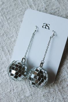 *with the circular ball shape and square mirrors, there are some spaces on the disco balls where the pieces don’t align perfectly* Disco Style Silver Jewelry For Party, Disco Accessories, Disco Ball Earrings, Square Mirrors, Estilo Hippy, Estilo Hippie, Mirror Ball, Disco Balls, Ball Earrings