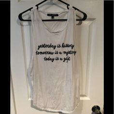 New Without Tags Excellent Condition Never Worn Spring White Slogan Tank Top, White Slogan Casual Tank Top, White Casual Slogan Tank Top, White Text Print Tank Top For Spring, White Tank Top With Text Print For Spring, Trendy White Slogan Tank Top, White Casual Tank Top With Text Print, Casual White Tank Top With Text Print, Trendy White Tank Top With Slogan