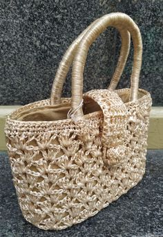 "Welcome! A beautiful vintage beige raffia handbag In good vintage condition! Measures: W: 9.24\" (24 cm) H with handles: 9.24\" (24 cm) Deep: 3.5\" (8 cm) Thanks for stopping by!!IMPORTANT: Due to the delicate situation We're all going through, and in order to keep the safety of courier workers too, all orders will be dispatched when alert sanitary finished. You can purchased or reserve items like always. Thanks so much for your understanding." Cream Rectangular Straw Bag With Top Carry Handle, Rectangular Cream Straw Bag With Top Carry Handle, Rectangular Cream Straw Bag With Top Handle, Beige Straw Bag With Top Carry Handle, Handheld Cream Straw Bag With Handles, Elegant Cream Straw Bags, Cream Rectangular Straw Bag With Handles, Elegant Jute Basket Straw Bag, Vintage Handmade Straw Bag For Daily Use