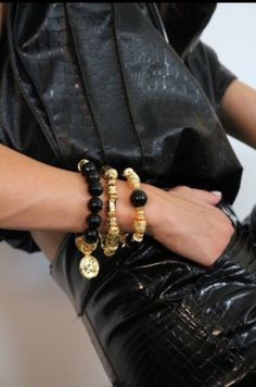 ✨ Unveil the essence of artisan elegance with our Majalis-crafted bracelet, a masterpiece fashioned for the modern woman. Our handcrafted bracelet is a treasure rendered in a stunning gold plated bangle, embracing the wrist with a sophisticated air. Each unique cuff boasts black, natural stone encased in a lustrous brass setting, hand-selected to ensure your piece is as distinctive as you are. Crafted with an attention to detail that is second to none, this exquisite accessory is more than just a bracelet for women; it is a symbol of the artistry and passion that defines Majalis's limited editions. Wear this gold plated bracelet with confidence from sunrise to sunset, its day-to-night versatility will compliment your every look. Considering a Valentine's Day gift that speaks the language o Luxury Evening Jewelry With Oyster Bracelet, Elegant Hand Wrapped Gold Beaded Bracelets, Luxury Bangle Bracelets For Evening, Luxury Adjustable Beaded Bracelets For Party, Luxury Silver Beaded Bracelets For Party, Luxury Handmade Cuff Bracelet For Formal Occasions, Luxury Cuff Bracelet For Parties, Luxury Cuff Bangle Bracelet For Party, Luxury Bangle Bracelets For Party