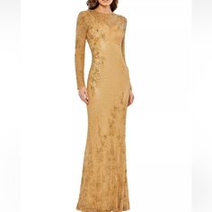 Mac Duggal's Long-Sleeve Gown Is Finished With Elegant Bead Embellishments For Added Dimension. Round Neck Long Sleeves Backzip Closure 100% Polyester Spot Clean Imported Size & Fit About 61” From Shoulder To Hem Line Drawn Through The Name To Prevent Store Returns. Item Was Purchased As In Store Final Sale Merchandise. If You Need Additional Information Or Pictures Please Ask Prior To Making A Purchase. Glamorous Long Sleeve Gold Gown, Glamorous Mother Of The Bride Dress With Sweep Train, Glamorous Gold Long Sleeve Gown, Gold Long Sleeve Gown For Prom Season, Gold Long Sleeve Gala Gown, Gold Long Sleeve Gown For Gala, Champagne Fitted Long Sleeve Mother Of The Bride Dress, Long Sleeve Embellished Sequin Dress For Gala, Gold Long-sleeve Evening Dress For Gala