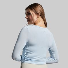 Gone are the days of wearing thick long sleeves that leave you working up a sweat before your workout even begins. Thanks to the breathable fabric, our Look At Me Long Sleeve keeps you cool and comfortable no matter how demanding the WOD. Plus, with flattering ruched sides and laidback styling, it seamlessly doubles as an everyday shirt for casual outings. Angel Blue, Keep Your Cool, Dream Wardrobe, Breathable Fabric, Matter, Long Sleeves, Wardrobe, Long Sleeve, Fabric