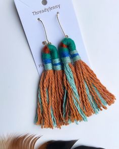 "Textile Earrings Made of Cotton  Indigo + Madder Root  Plant Dyed Overall Length - 3.5\" Width -Top - .5\" Bottom Tassel- 2\" Hypoallergenic gold plated ear wire" Bohemian Woven Jewelry For Spring, Gold Bohemian Tassel Earrings For Spring, Spring Bohemian Woven Jewelry, Bohemian Woven Earrings For Spring, Green Bohemian Woven Earrings, Bohemian Green Woven Earrings, Spring Handmade Adjustable Tassel Earrings, Yarn Jewelry, Textile Earrings