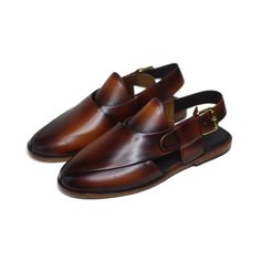 Exquisitely crafted with supple leather, this peshawari chappal would compliment any eastern ensemble. In a rich hickory color, it encapsulates elegance and comfort. All designs are made to order and each piece is uniquely created with a personality in mind; strong, significant, and one-of-a-kind. Finished product is delivered within 18-20 days after order is received. We are a small-scale handmade shoes brand operating from Pakistan. We specialize in a variety of handmade men's leather footwear Eastern Wear, Formal Dress Shoes, Mens Shoes Sandals, High Ankle Boots, Cow Calf, Semi Formal Dress, Sheep Leather, Mens Fashion Suits, Buffalo Leather