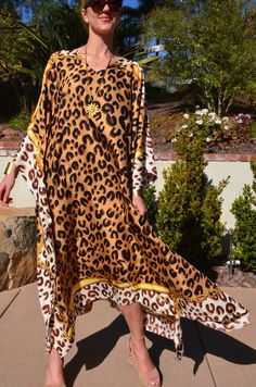 Striking silk caftan with brown leopard print on a gold background is truly spectacular for any occasion. One size. Fits many sizes from small ti X large . The width is 52 inches from edge to edge and the length is 51 inches. Silk Dress Beach, Long Silk Dress, Silk Caftan, Coverup Beach, Silk Kaftan, Silk Dress Long, Dress Beach, Brown Leopard, Beach Wears