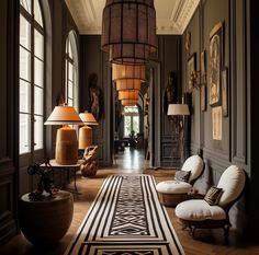 the hallway is decorated with antique furniture and lamps