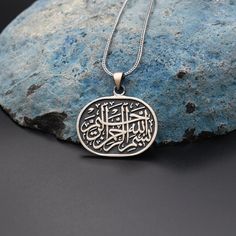 Besmele Engraved Silver Necklace, Islamic Silver Necklace, 925 Sterling Silver Necklace, Arabic Calligraphy Necklace ✦ Details ✦ * Material: 925 Sterling Silver * Weight of pendant :7,70  gram. * Chain Weight :             20 Inches = 5.00 Gr             22 Inches = 5.60 Gr             24 Inches = 6.05 Gr             26 Inches = 6.70 Gr             28 Inches = 7.10 Gr * Sides oxidized * Stamp: 925 ✦ Shipping ✦ * Processing time: 1-3 business days. * This item ships from my Turkish workshop in Is Etched Sterling Silver Pendant Necklace, Traditional Pendant Jewelry For Commemoration, Traditional Oval Pendant Necklace As Gift, Traditional Oval Pendant Necklace For Gift, Engraved White Gold Oval Pendant Necklace, Silver 925 Stamped Oval Pendant Necklace, Silver Oval Pendant Necklace Stamped 925, Silver Etched Pendant Necklace, Sterling Silver Etched Necklace For Gift