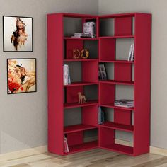 a red bookcase in the corner of a room