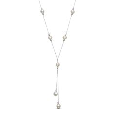 Shimmering freshwater cultured pearls are stationed along this elegant lariat necklace, with an additional pair dangling at staggered lengths from the center. Delicate textured beads bookend each pearl to complete the look. Crafted in sterling silver, the 18-inch cable chain secures with a spring ring clasp. Formal Pearl Lariat Necklace, Formal Dangle Lariat Necklace With Pearl Drop, Classic Pearl Chain Lariat Necklace For Formal Occasions, Formal Adjustable Lariat Necklace With Pearl Drop, Formal Dangle Pearl Drop Lariat Necklace, Classic Formal Lariat Necklace With Pearl Drop, Formal Adjustable Backdrop Necklace With Pearl Drop, Adjustable Formal Backdrop Necklace With Pearl Drop, Classic Lariat Pearl Necklace With Adjustable Chain