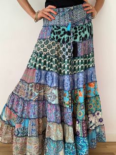 "This gorgeous colourful gypsie skirt is all fun to wear, boho style inspired long and flowy true hippy girl skirt it is free size and floor length always one of a kind  patchwork, made of varieties of different fabrics with floral patterns,  very easy to wear and comfy  it has elasticated waist band, and will fit most of sizes S-L MEASURE One Size Fits Most length 39 \"/100 cm waist 28-40\" / 66-100cm  For more boho style ideas please visit also  https://www.etsy.com/uk/shop/Gyaki CARE * Hand w Bohemian Maxi Dress With Ruffled Skirt For Summer, Bohemian Beach Maxi Dress With Ruffled Skirt, Bohemian Maxi Dress With Ruffled Skirt For Beach, Blue Patchwork Maxi Skirt For Summer, Bohemian Maxi Dress With Ruffled Skirt For Spring, Blue Ruffled Maxi Skirt, Green Bohemian Maxi Skirt For Festival, Summer Bohemian Tiered Maxi Skirt, Bohemian Tiered Maxi Skirt For Summer