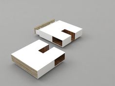 two pieces of white cardboard sitting on top of each other