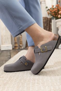 Exude casual-cool style in comfort in these slip-on-and-go clogs, crafted from a soft suede in a versatile neutral hue for effortless pairing. A durable TPU sole ensures tread-safe steps. Suede upper Man-made leather lining Man-made insole TPU sole Reindeer Headband, Classic Grey, Grey Crewneck, Daily Dress, Dress Jewelry, Clogs Shoes, Soft Suede, Boot Shop, Heeled Mules