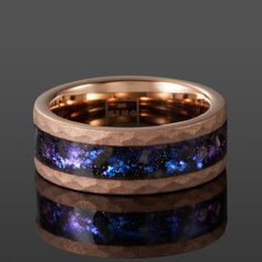 Nebula is named after the captivating colours of the universe, captured in this special band. Comprised of fragments of authentic Muonionalusta meteorite and crushed opal stone embedded inlaid into a durable tungsten carbide body, Nebula is truly a piece to behold. Since every meteorite fragment displays unique patterns, your ring will truly be one-of-a-kind. We use US standard ring sizes. To find your perfect fit, please refer to our sizing guide below. However, we always recommend verifying your US ring size with a jeweller for meteorite rings which cannot be resized due to material scarcity. Meteorite Rings, Quality Rings, Rings Bands, Meteorite Ring, Handcrafted Rings, Opal Stone, Ring Sizes, Tungsten Carbide, Royal Oak