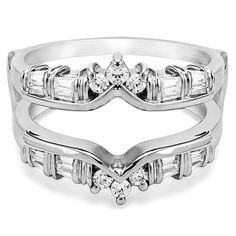 two white gold wedding rings with baguettes and diamonds on each band, set in 18k white gold