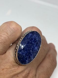 Large genuine aqua blue Lapis Lazuli Vintage ring Low content silver not sterling. Can be re sized. My jeweler charges $10-$20 All rings are shipped in a nice gift box. Check out our over a THOUSAND great reviews Engraving is $4 per letter and is not always perfect depending on the piece. It can take a few days if the jeweler is busy. This is payable to Paypal Judithsltd@gmail.com Silver Faceted Sapphire Ring As Gift, Silver Faceted Sapphire Ring For Gift, Faceted Silver Sapphire Ring As Gift, Sapphire Crystal Oval Ring For Gift, Nickel-free Blue Crystal Ring, Adjustable Blue Rings With Large Stone, Blue Crystal Sterling Silver Ring Stamped 925, Blue Sterling Silver Crystal Ring, Stamped 925, Handmade Blue Crystal Ring In Sterling Silver