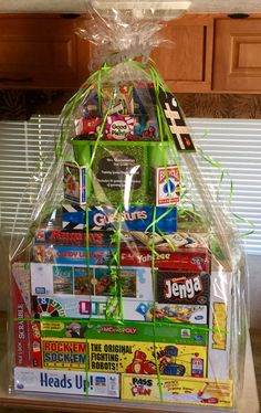 a large basket filled with lots of food and snacks on top of a kitchen counter