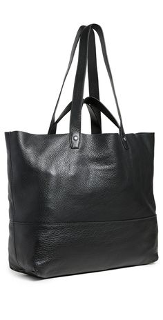 Find RAG & BONE Logan Tote on Editorialist. The rag & bone Logan Tote is crafted from pebbled cowhide leather. The tote features silver-tone hardware, logo embroidery at the front, an open top, patch interior pockets, and a suede lining. It measures 15.25 inches in height, 22 inches in length, and 5 inches in depth. The strap drop is 11.75 inches and the handle drop is 4.25 inches. Pebbled Leather Bag With Leather Backing For Daily Use, Daily Use Pebbled Leather Bag With Leather Backing, Everyday Pebbled Leather Shoulder Bag With Gunmetal Hardware, Everyday Shoulder Bag With Gunmetal Hardware And Pebbled Leather, Pebbled Leather Bags For Everyday Use, Black Pebbled Leather Bag With Gunmetal Hardware, Casual Leather Shoulder Bag With Silver-tone Hardware, Everyday Leather Bags With Snap Closure, Leather Shoulder Bag With Snap Closure For Shopping