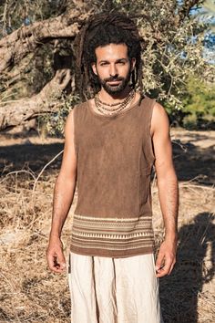 ❂ Walnut dyed brown hemp cotton tank top with tribal print . soft and earthy ❂⫸⫸ SIZE ⫸⫸S, M, L and XLPlease check the sizing chart in the last picture⫸⫸ MATERIALS ⫸⫸We focus on natural materials and aim to support traditional crafts and ancient skills ~striving to go deeper to the source of all materialsOur vision is to be able to connect with each being involved in the making from the very source,Being able to Source the most ethical, fair trade, Eco and conscious materials ⫸⫸ COLOR ⫸⫸❀ Please Casual Cotton Tank Top For Festivals, Hippie Cotton Tank Top, Brown Vest Top For Summer, Casual Brown Tank Vest, Brown Summer Vest Top, Bohemian Tank Vest For Summer, Brown Cotton Tank Top For Summer, Brown Cotton Summer Tank Top, Hippie Style Summer Vacation Tank Top