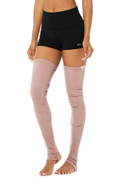 Engineered to move. Easy to layer. Made from the same soft, ribbed, move-with-you performance fabric as our best-selling Goddess Leggings, the Goddess Leg Warmers wear over-the-knee with a leotard or shorts or layered with leggings for extra warmth. Engineered stirrups fit comfortably under the heel or tucked up around the ankle. Sweat-wicking technology. Stirrups keep them in place; wear over the heel or at the ankle 4-way stretch fabric for a move-with-you feel Wear-tested by our in-house team Alo Goddess Legging Outfit, Alo Yoga Stretch Leggings For Sports, Alo Yoga Sporty Leggings For Sports, Sporty Alo Yoga Leggings For Sports, Functional Compression Ribbed Activewear, Functional Ribbed Compression Activewear, Athleisure Ribbed Sports Bottoms, Athleisure Ribbed Bottoms For Sports, Alo Yoga Sports Leggings